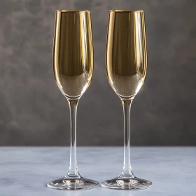 Two Golden Champagne Glasses