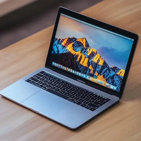 Modern Laptop with Scenic Display on Wooden Surface