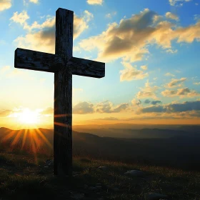 Wooden Cross and Sunset Over Hills