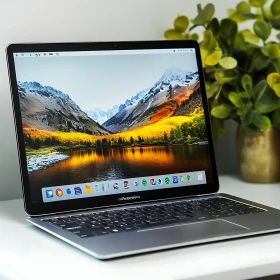 Modern Laptop Setup with Scenic Display