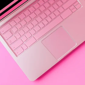 Contemporary Pink Laptop Keyboard and Trackpad - Close-Up View