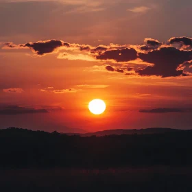 Glowing Sunset with Dark Silhouette