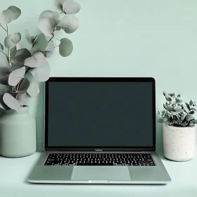 Modern Workspace Design with Laptop and Green Plants