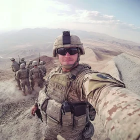 Military Personnel in Arid Terrain Selfie