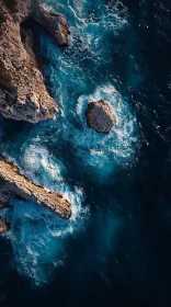 Bird's-Eye Perspective of Sea Waves and Cliffs