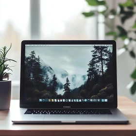Laptop Displaying Nature Scene at Workspace