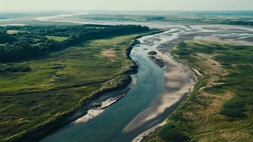 Scenic Aerial Landscape of a River and Green Fields