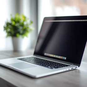 Sleek Laptop Setup In A Modern Office