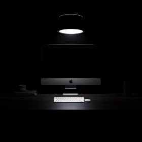 Modern Desktop Setup in Dim Lighting