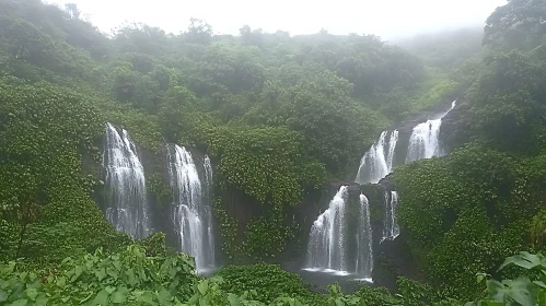 Misty Forest with Cascading Waterfalls