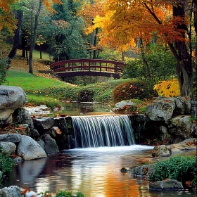 Peaceful Waterfall in Vibrant Autumn Forest