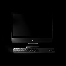 Modern Black Desktop with Keyboard and Mouse