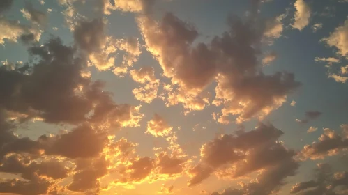 Tranquil Sunset: A Sky of Golden Clouds