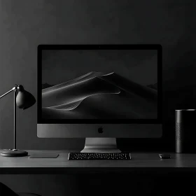 Monochromatic Workspace Setup with Black Accessories
