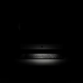 Mystical Computer Setup in Shadows