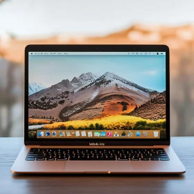 MacBook with Scenic Desktop Image