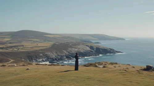 Peaceful Woman on Cliff Overlooking the Sea