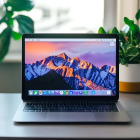 Sleek Laptop with Scenic Mountain Background