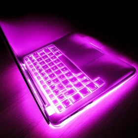Glowing Pink Laptop Keyboard