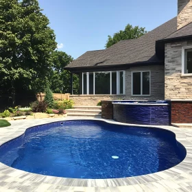 Tranquil Backyard Pool and Garden with Modern Home