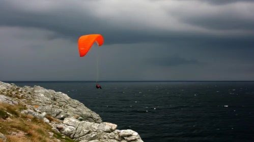 Orange Paraglider Taking Off on a Tranquil Lake | Stormy Seascapes