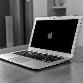 Modern Laptop with Apple Logo