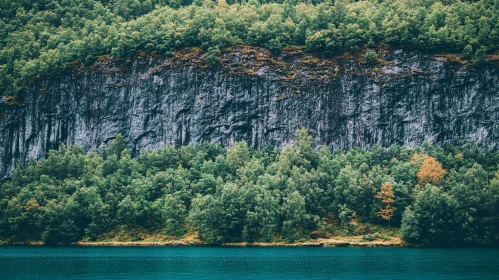 Tranquil Nature Scene with Cliff and Lake