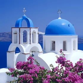 Greek Church with Blue Domes and Flowers