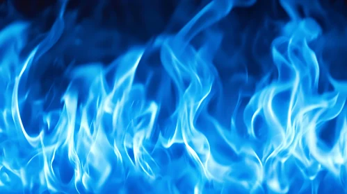 Dancing Blue Fire against Dark Background