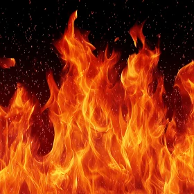 Fiery Flames Against Black Background
