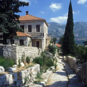 Picturesque Stone House with Red Tile Roof