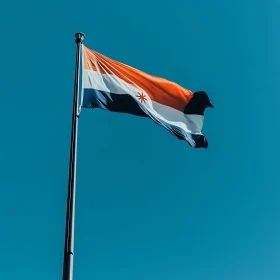 Patriotic Flag Against Blue Sky