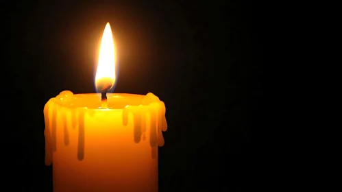 Glowing Candle in the Darkness