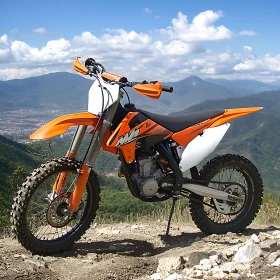 Orange Motorcycle on Rocky Terrain