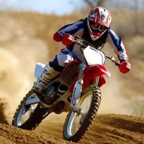 Dirt Bike Racing Through Sandy Terrain