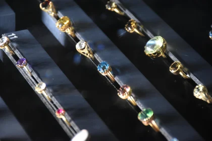 Elegant Gem-Adorned Gold Rings Display