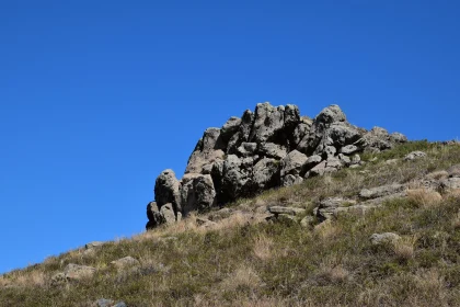 Hillside Rocks Under Clear Sky