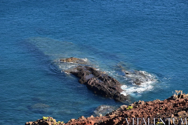 PHOTO Ocean Waves and Rugged Rocks