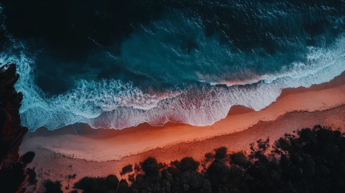 Turquoise Waves and Reddish Beach Aerial View