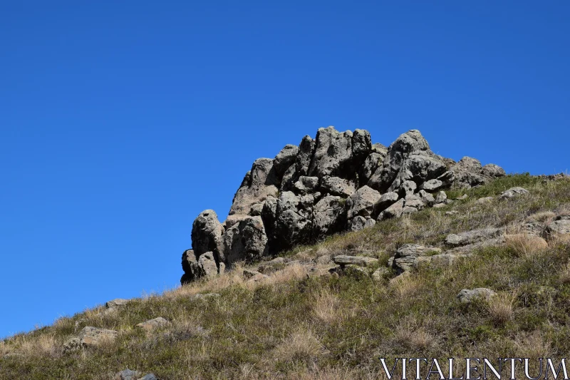 PHOTO Hillside Rocks Under Clear Sky