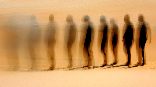 Blurred Figures on a Desert Landscape