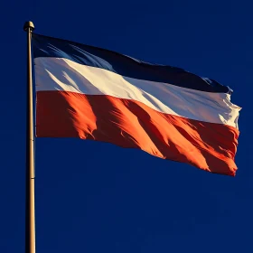 Patriotic Flag under Clear Skies