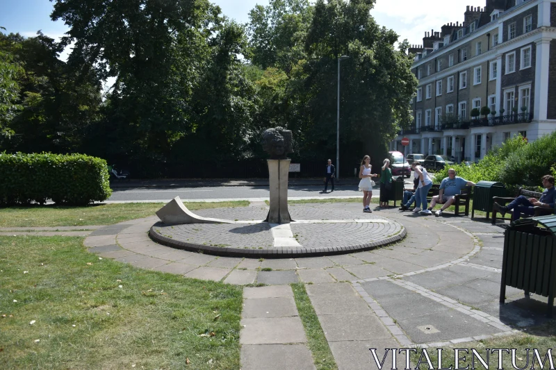 Urban Sculpture with Park View Free Stock Photo