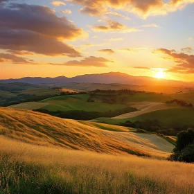 Scenic Sunset Landscape with Green Hills