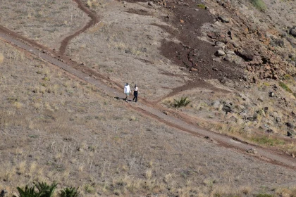 People Walking on a Dirt Path