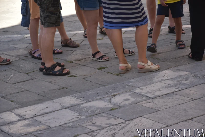 PHOTO Feet of Urban Dwellers on Pavement