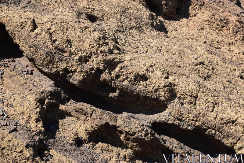 Rugged Surface and Shadows on Rock Formation Free Stock Photo