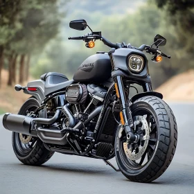 Sleek Black Motorcycle on Grey Asphalt