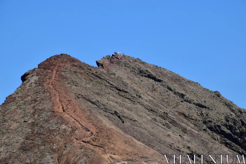 Mountain Summit and Adventurers Free Stock Photo