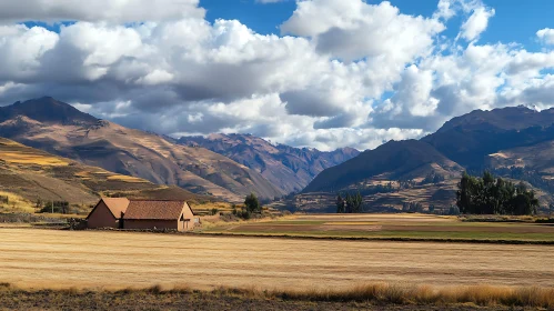 Rural Mountain Scenery With Farmhouse